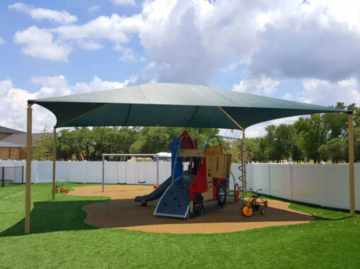 Shade structure over a daycare playground
