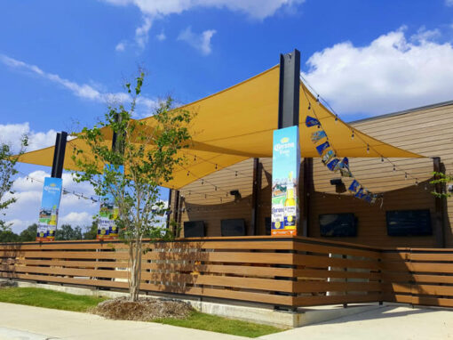 Shade sail over an outdoor restaurant patio