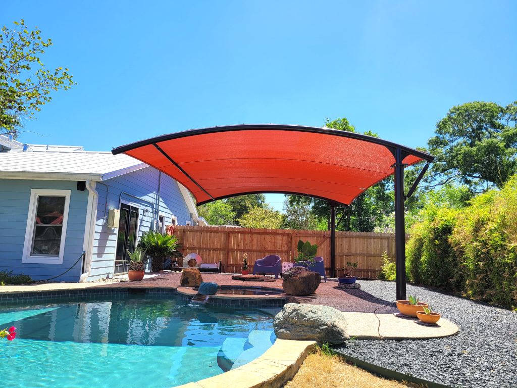 Curved cantilever shade structure