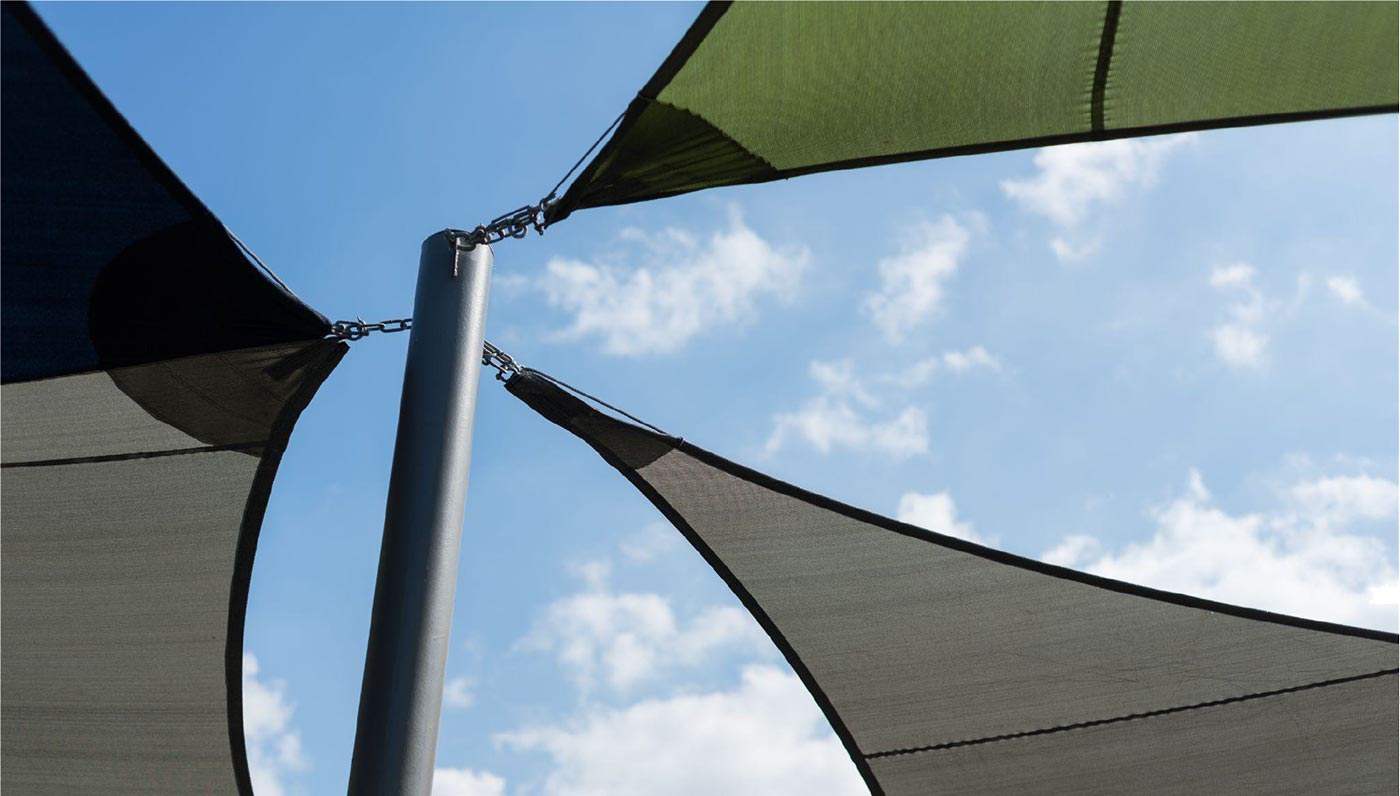 shade sail corner hardware and tensioning connections on a steel post, checked during frame inspection